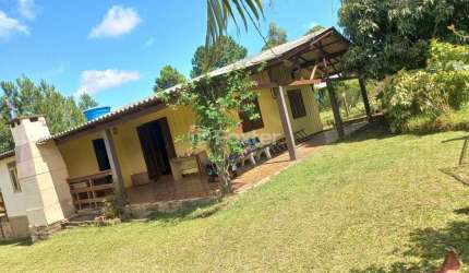 Casa em condomínio fechado com 3 quartos à venda na Rua Canários, 96, Águas Claras, Viamão, 100 m2 por R$ 265.000