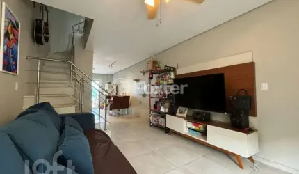 Casa em condomínio fechado com 4 quartos à venda na Rua Doutor Sérgio de Figueiredo, 278, Guarujá, Porto Alegre, 118 m2 por R$ 439.000