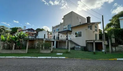 Casa em condomínio fechado com 4 quartos à venda na Rua Cangerana, 400, São Lucas, Viamão, 400 m2 por R$ 695.000