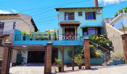 Casa com 3 quartos à venda na Rua Doutor Francisco de Sá Brito, 240, Partenon, Porto Alegre, 266 m2 por R$ 1.100.000