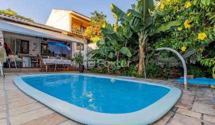 Casa com 3 quartos à venda na Rua Menezes Paredes, 256, Nonoai, Porto Alegre, 131 m2 por R$ 551.000