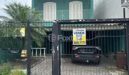 Casa com 4 quartos à venda na Rua Hermínio Machado, 653, Jardim Algarve, Alvorada, 192 m2 por R$ 490.000