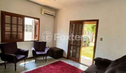Casa com 4 quartos à venda na Travessa Antilhas, 73, Piratini, Sapucaia do Sul, 181 m2 por R$ 392.000