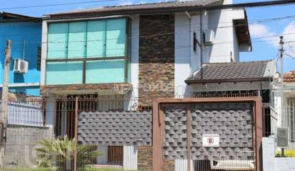 Casa com 3 quartos à venda na Rua Dona Firmina, 143, Vila São José, Porto Alegre, 165 m2 por R$ 680.000