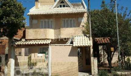 Casa com 4 quartos à venda na Rua Querubim Costa, 113, Coronel Aparício Borges, Porto Alegre, 250 m2 por R$ 554.000