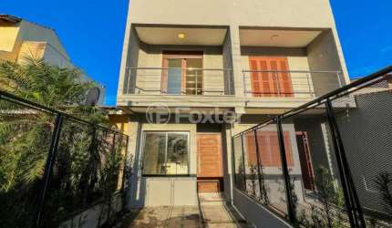 Casa em condomínio fechado com 2 quartos à venda na Rua Attilio Bettio, 53, Aberta dos Morros, Porto Alegre, 136 m2 por R$ 376.000