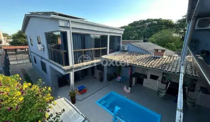 Casa com 4 quartos à venda na Rua Sapucaia, 840, Niterói, Canoas, 220 m2 por R$ 790.000