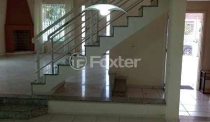 Casa com 4 quartos à venda na Rua Ipê Rosa, 601, Carianos, Florianópolis, 256 m2 por R$ 1.150.000