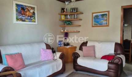 Casa com 3 quartos à venda na Rua Oswaldo Goidanich, 66, Vila Nova, Porto Alegre, 262 m2 por R$ 390.000