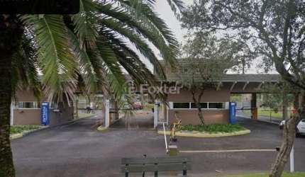 Terreno em condomínio fechado à venda na Avenida Jaçanã, 951, Centro, Xangri-Lá, 450 m2 por R$ 950.000
