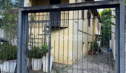 Casa com 3 quartos à venda na Rua Felicíssimo de Azevedo, 753, Auxiliadora, Porto Alegre, 100 m2 por R$ 640.000