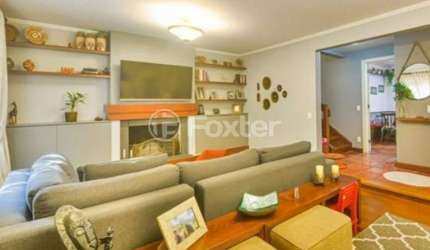 Casa em condomínio fechado com 3 quartos à venda na Rua Professor Carlos de Paula Couto, 500, Cavalhada, Porto Alegre por R$ 1.300.000