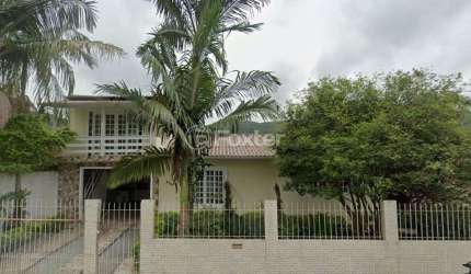 Casa com 3 quartos à venda na Rua Luiz Aléssio Lenhani, 234, São Sebastião, Palhoça, 17180 m2 por R$ 620.000