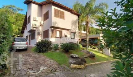 Casa com 5 quartos à venda na Avenida Luiz Boiteux Piazza, 3772, Cachoeira do Bom Jesus, Florianópolis, 220 m2 por R$ 1.850.000