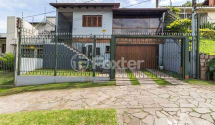 Casa com 3 quartos à venda na Rua Doutor Egydio Michaelsen, 250, Cavalhada, Porto Alegre, 292 m2 por R$ 1.385.000