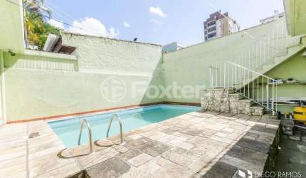 Casa com 3 quartos à venda na Rua José Scutari, 411, Passo da Areia, Porto Alegre, 180 m2 por R$ 954.000