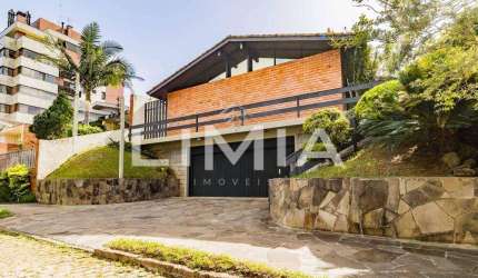 Casa com 4 quartos à venda na Travessa Java, 76, Jardim Lindóia, Porto Alegre, 480 m2 por R$ 1.095.000