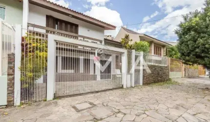 Casa com 4 quartos à venda na Rua Maestro Salvador Campanella, 58, Jardim Itu Sabará, Porto Alegre, 240 m2 por R$ 1.025.000