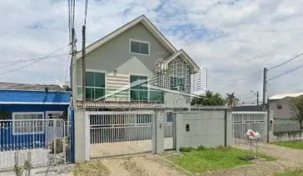 Casa em condomínio fechado com 3 quartos à venda na Rua Primo Lourenço Tosin, 100, Novo Mundo, Curitiba, 136 m2 por R$ 700.000
