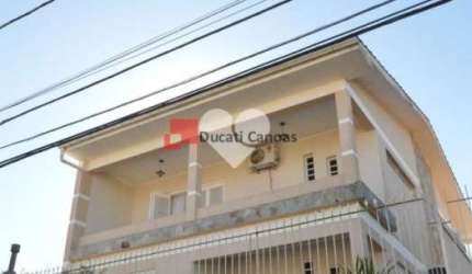 Casa com 4 quartos para alugar na Rua Cezar Lattes, Centro, Canoas, 265 m2 por R$ 7.000