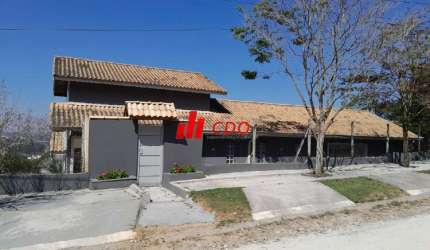 Imponente casa em condomínio à venda em Cotia-SP, Parque Rizzo: 3 quartos, 1 suíte, 3 salas, 3 banheiros, 6 vagas, 400m².
