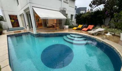 Casa com 4 quartos à venda na Rua dos Botos, 66, Jurerê Internacional, Florianópolis por R$ 5.800.000