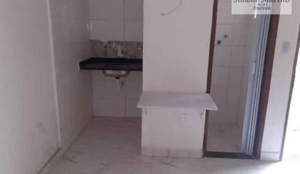 Village com 1 dormitório à venda, 32 m² por R$ 149.000 - Caiçara - Praia Grande/SP