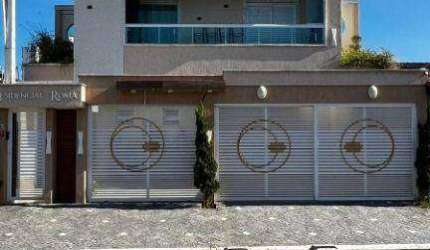Casa com 3 dormitórios à venda, 84 m² por R$ 468.000,00 - Caiçara - Praia Grande/SP