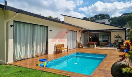 Casa à venda em Cotia-SP, Chácara Eliana: 3 quartos, 3 suítes, 4 banheiros e 277,44 m² de área. Agende sua visita!