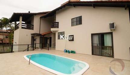 Casa em condomínio fechado com 6 quartos à venda na Rodovia Haroldo Soares Glavan, --, Cacupé, Florianópolis por R$ 2.399.000