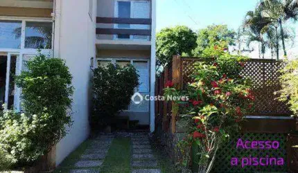Sobrado com 3 dormitórios à venda, 158 m² por R$ 1.210.000,00 - Praia do Arrastão - São Sebastião/SP