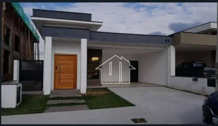 Casa com 3 dormitórios à venda, 158 m² por R$ 1.100.000,00 - Condomínio Malibu - Caçapava/SP