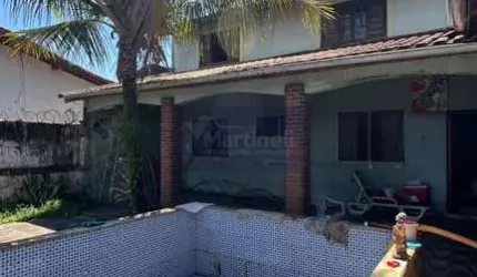 Casa à venda em Itanhaém-SP, Jardim Grandesp: 3 quartos, 2 salas, 3 vagas, 85m² de área. Imperdível!