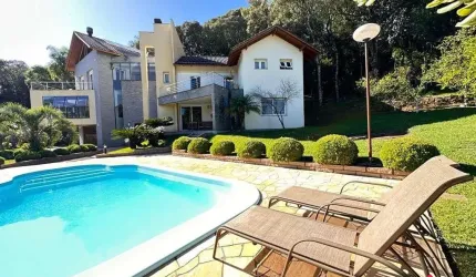 Casa em Condominio para Venda - 583m², 4 dormitórios, sendo 3 suites, 4 vagas - Linha 40