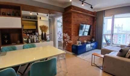 APARTAMENTO COM 2 QUARTOS COM VISTA PARCIAL PARA O MAR NO BAIRRO CAMPINAS SÃO JOSÉ/SC