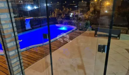 CASA DE ALTO PADRÃO COM VISTA PARA O MAR COM 3 QUARTOS SENDO 1 SUÍTE E 3 VAGAS DE GARAGEM NO SACO DOS LIMÕES EM FLORIANÓPOLIS/SC