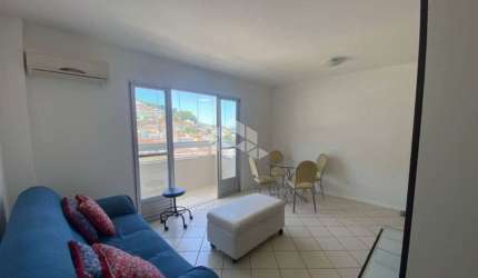 LIADO COM 3 QUARTOS, VAGA DE GARAGEM E VISTA PANORÂMICA NO CENTRO DE FLORIANÓPOLIS