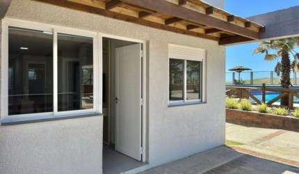 Casa 02 Dorm à venda no Bairro CAPÃO NOVO com 60 m² de área privativa - 1 vaga de garagem