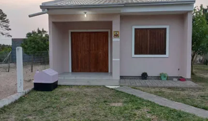 Casa 02 Dorm à venda no Bairro CAPÃO NOVO - 1 vaga de garagem