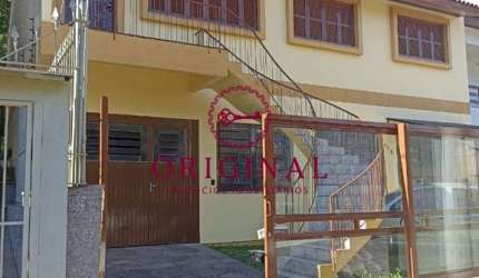 Casa com 3 quartos à venda na Rua Vico Parolini Thompson, 586, Cristo Redentor, Caxias do Sul por R$ 980.000