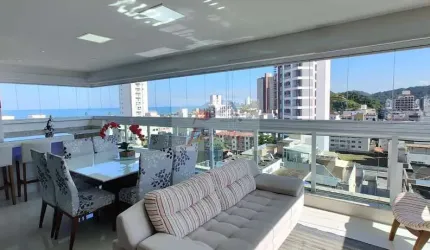 Apartamento com 3 suítes  decorado com vista mar à venda na praia da Enseada