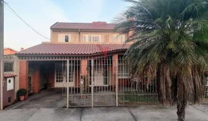CASA NO UMUHARAMA - Pelotas , Terraço, Churrasqueira,estuda permuta ,pronta para morar