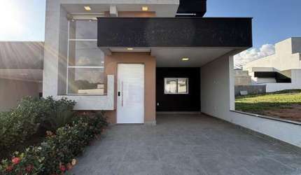 Casa com 3 dormitórios à venda, 105 m² por R$ 660.000 - Condomínio Villaggio Ipa
