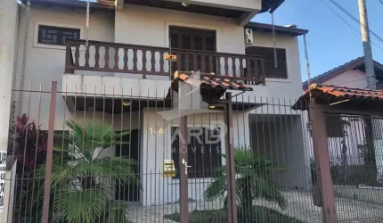 Casa com 3 quartos à venda na Rua Juvenil Pereira Fraga, 104, Cavalhada, Porto Alegre por R$ 900.000