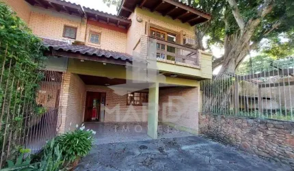 Casa com 3 quartos à venda na Rua José Kanan Aranha, 277, Jardim Isabel, Porto Alegre por R$ 795.000