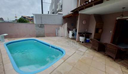 Casa em condomínio fechado com 3 quartos à venda na Rua Carlos Maximiliano Fayet, 215, Hípica, Porto Alegre por R$ 600.000