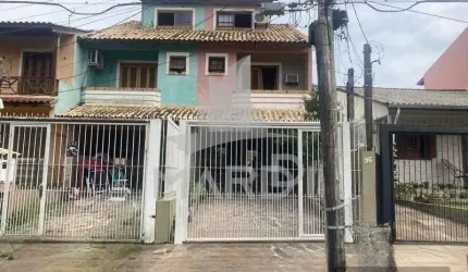 Casa com 2 quartos à venda na Rua James Bocacio, 96, Hípica, Porto Alegre por R$ 550.000
