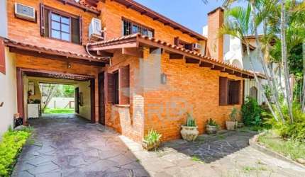 Casa com 3 quartos à venda na Rua Adão Pinheiro da Silva, 235, Ipanema, Porto Alegre por R$ 790.000