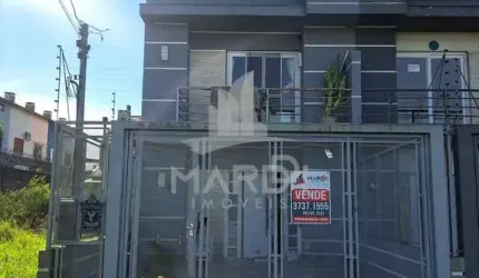 Casa com 3 quartos à venda na Rua Hilário Gonçalves Pinha, 50, Hípica, Porto Alegre por R$ 550.000