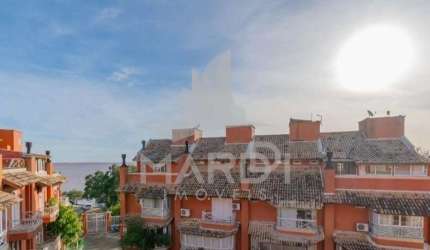 Casa em condomínio fechado com 3 quartos à venda na Avenida Guaíba, 4400, Vila Assunção, Porto Alegre por R$ 995.000